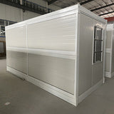 Portable folding container house